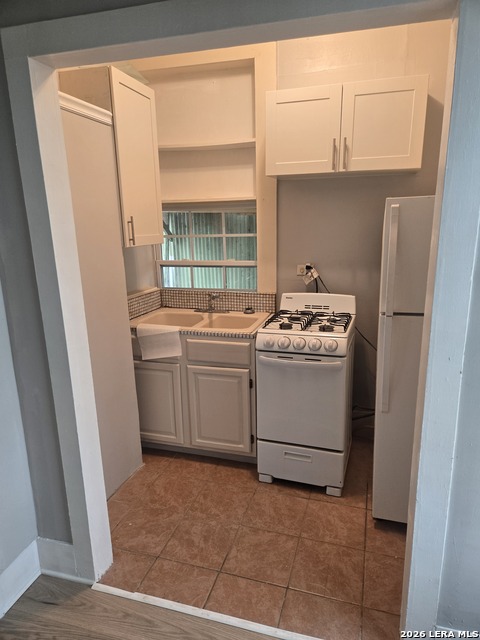 Image 7 of 29 For 203 Theo W Rear