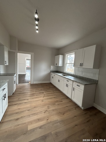 Image 6 of 28 For 329 Hot Wells  Front Unit