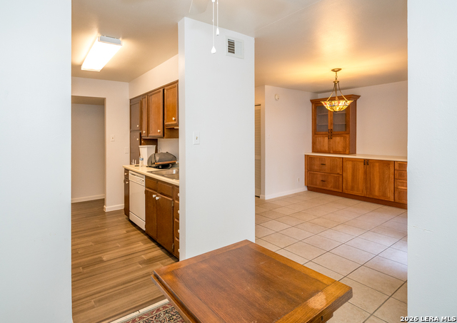 Image 13 of 40 For 8702 Village  106