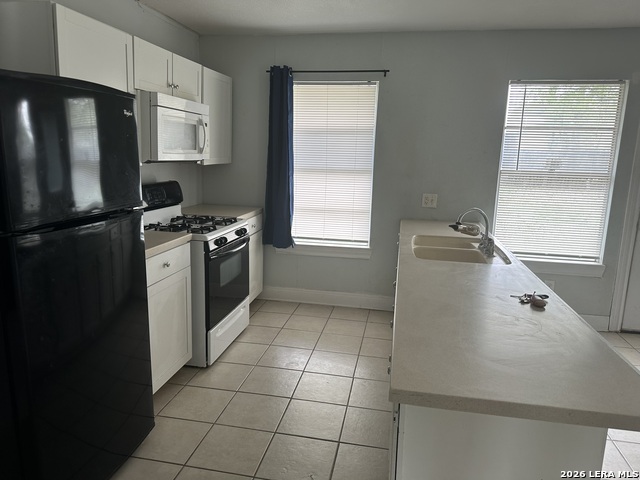 Image 4 of 9 For 4911 Longfellow Blvd