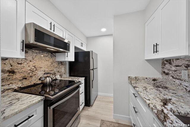 Image 16 of 27 For 11520 Huebner  501